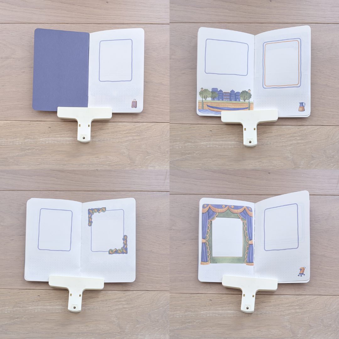 Four small open book-shaped cards or inserts displayed on a light wood floor, each attached to a white plastic clip. The cards feature blank photo frames, decorative borders, and a theater curtain design.