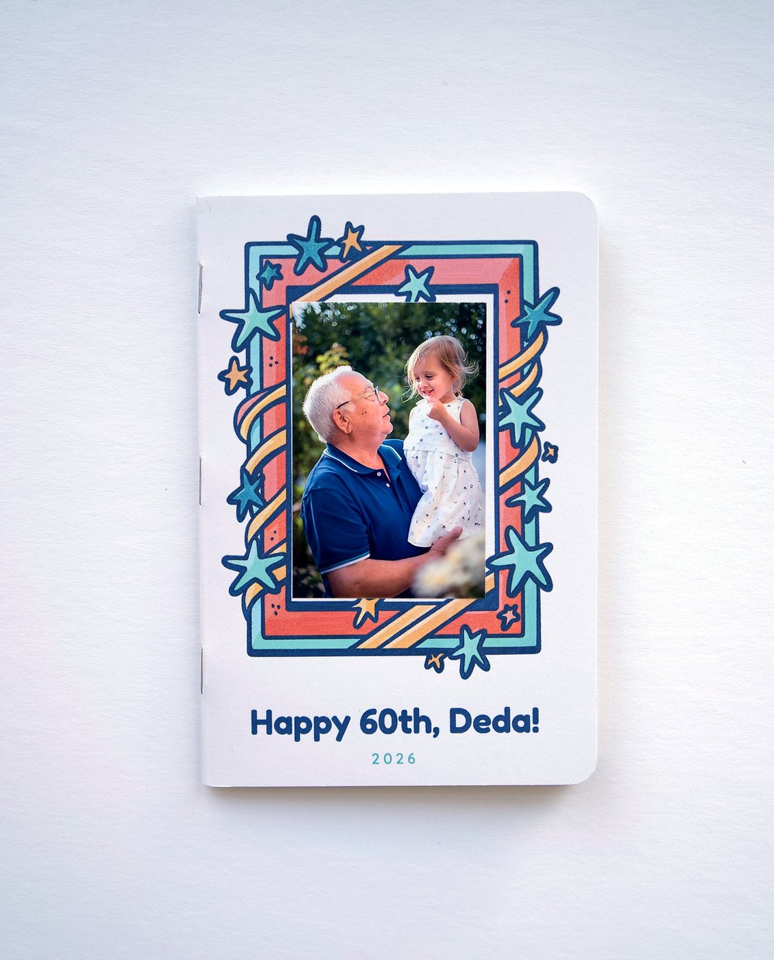 A Keeper journal with a grandfather and granddaughter on the cover, Happy 60th Deda